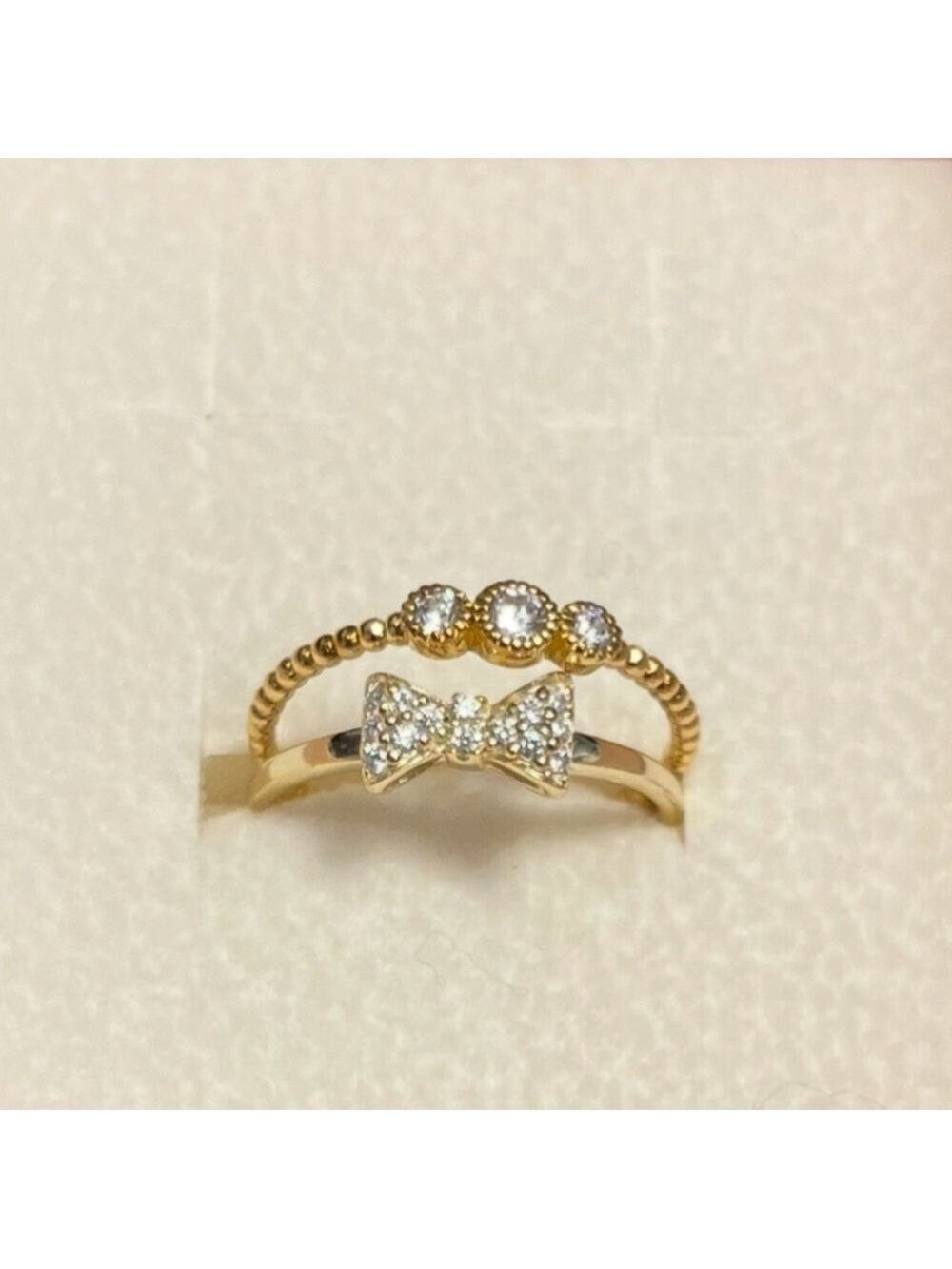 14k gold plating on sterling silver (Gold Vermeil) CZ Bow and Bezel rings size 6